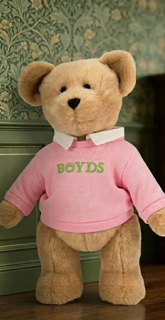 Een Boyds-beer in een roze trui
